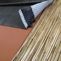 FAKRo rietgootstuk met aluminiumslabbe voor dakraam in rieten dak